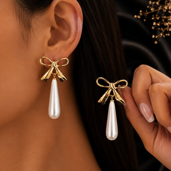 Elegant Gold Bow and Teardrop Pearl Dangle Earrings