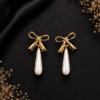 Elegant Gold Bow and Teardrop Pearl Dangle Earrings