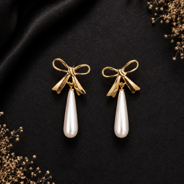 Elegant Gold Bow and Teardrop Pearl Dangle Earrings