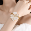 ChatGPT Image Jun 13, 2026, 11_47_53 AM Elegant White Marbled Enamel Statement Flower Gold Cuff Bracelet