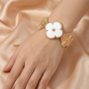 Elegant White Clover Quatrefoil Gold Hinged Cuff Bracelet with Beaded Edging