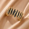 Modern Geometric Gold-Plated Hinged Cuff Bracelet with Navy Blue Enamel