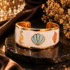 Untitled design - 2026-06-18T135011.064 Gold Plated Ocean Theme Enamel Cuff Bracelet for Women | Seashell & Seahorse Designer Open Cuff | Luxury Statement Jewelry